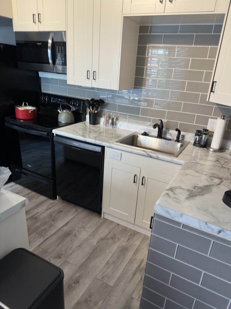 Bright white kitchen, second angle, after a deep clean