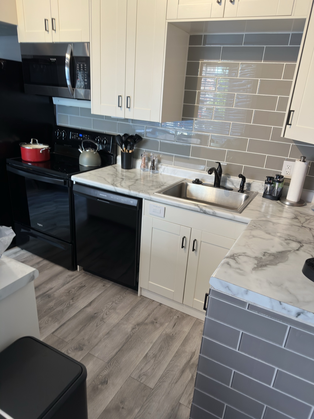 Spotless white kitchen after a deep clean