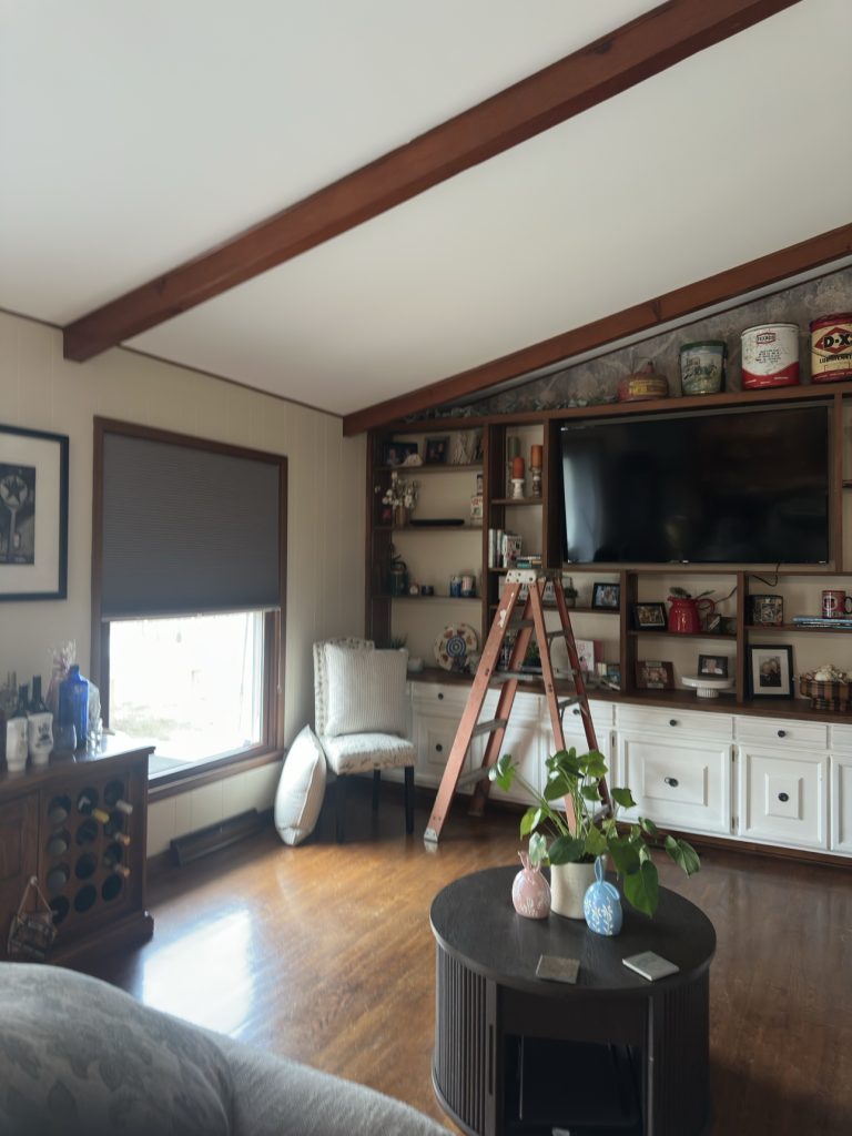 Tidy living room with entertainment wall after cleaning