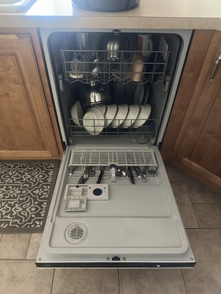 Dishwasher loaded with sparkling clean dishes